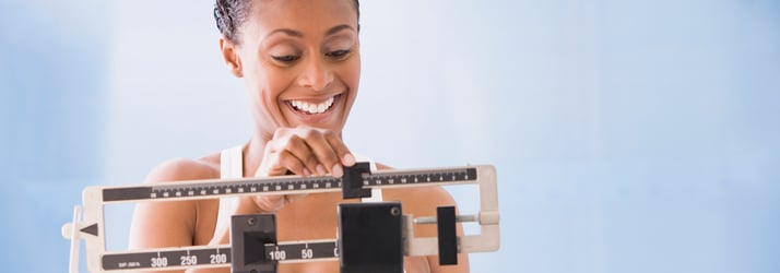 Happy-Woman-on-Scale Happy Woman on Scale